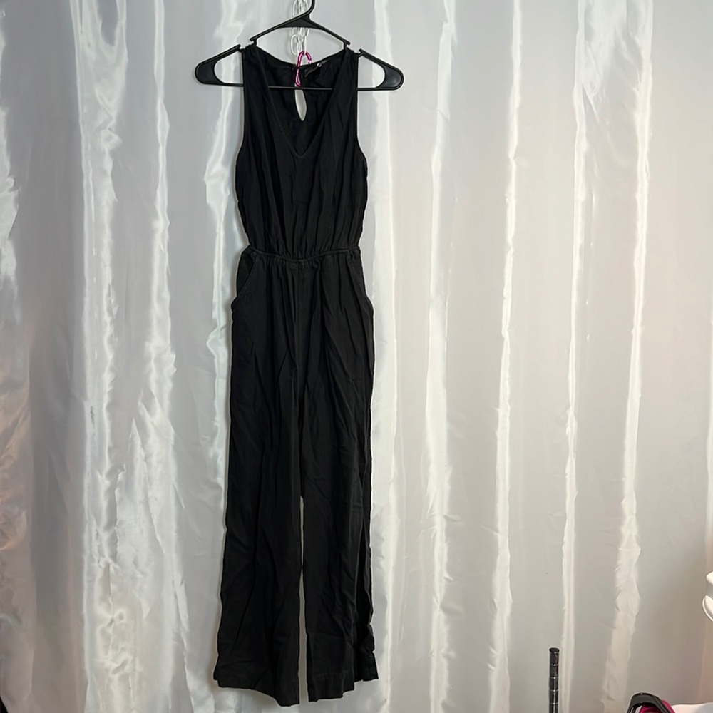 Women’s open back jump suit. 2229